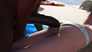 A girl enters a no bikini nudist zone with a bikini and quickly catches the eye of a big black cock